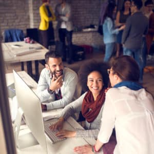 employees at a small business using technology