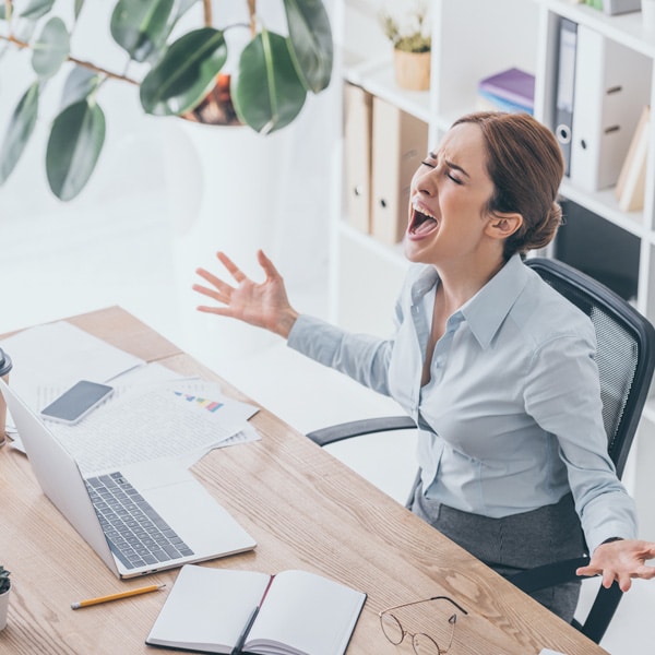 Frustrated woman showing it is time for a new managed service provider