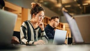 woman looking at email threat protection on the computer