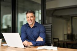 man smiling for his IT support services